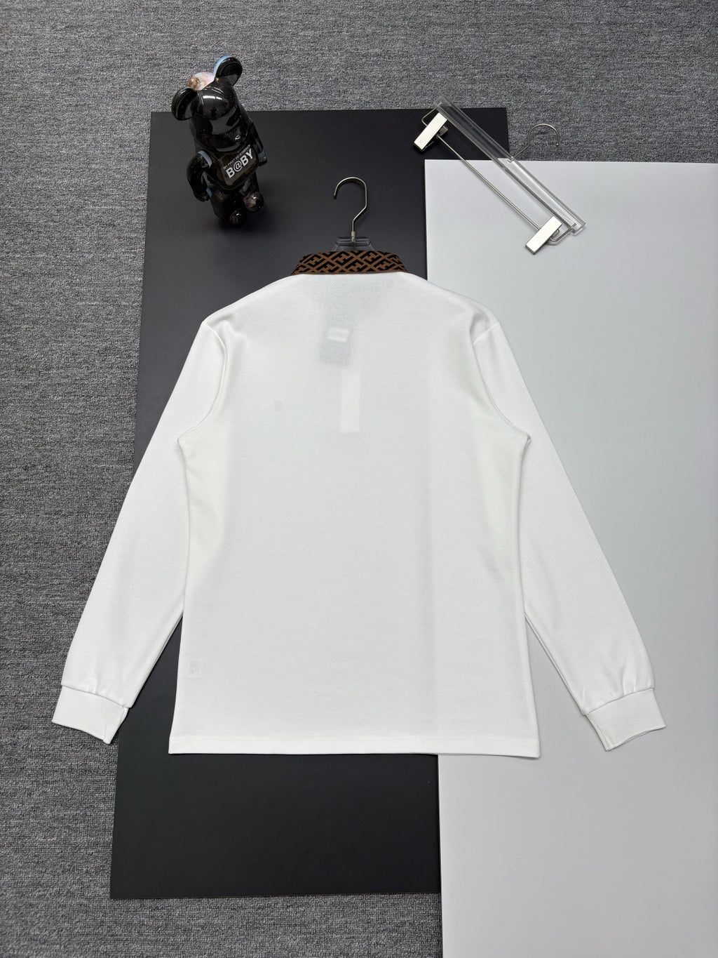 Fendi long-sleeve polo shirt, white, back view with neck logo