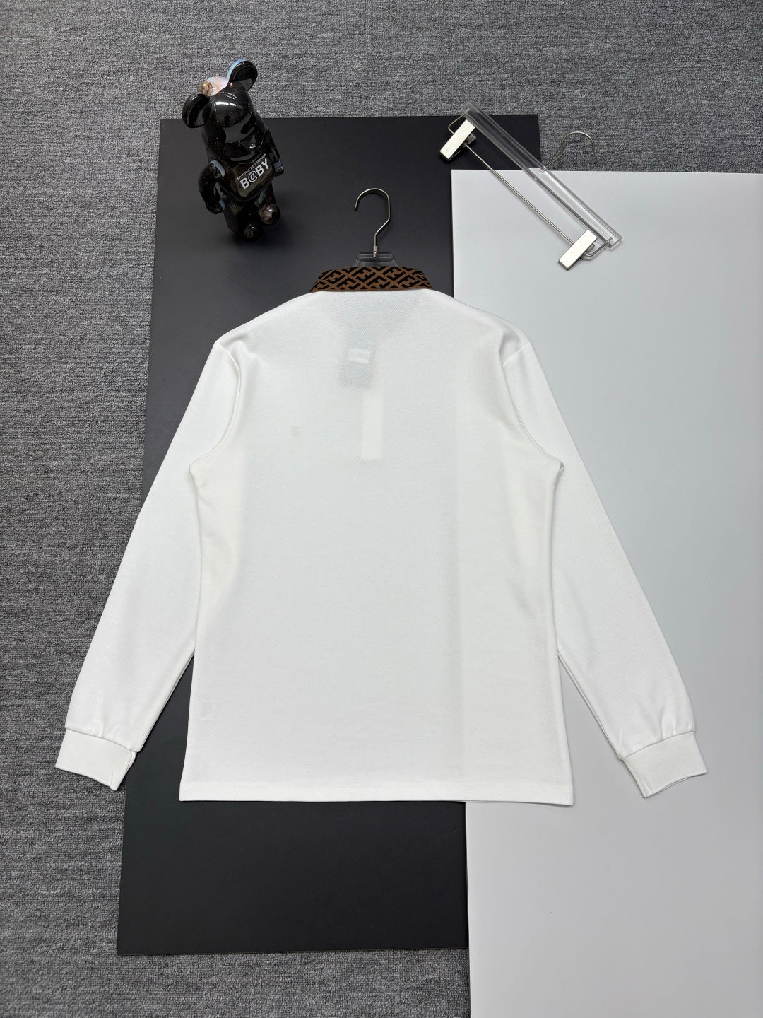 Fendi long-sleeve polo shirt, white, back view with neck logo