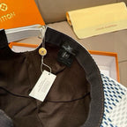 Louis Vuitton baseball cap interior with woven strap and hanging product tag