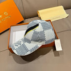 Louis Vuitton baseball cap with white-black geometric dot print, black crown band