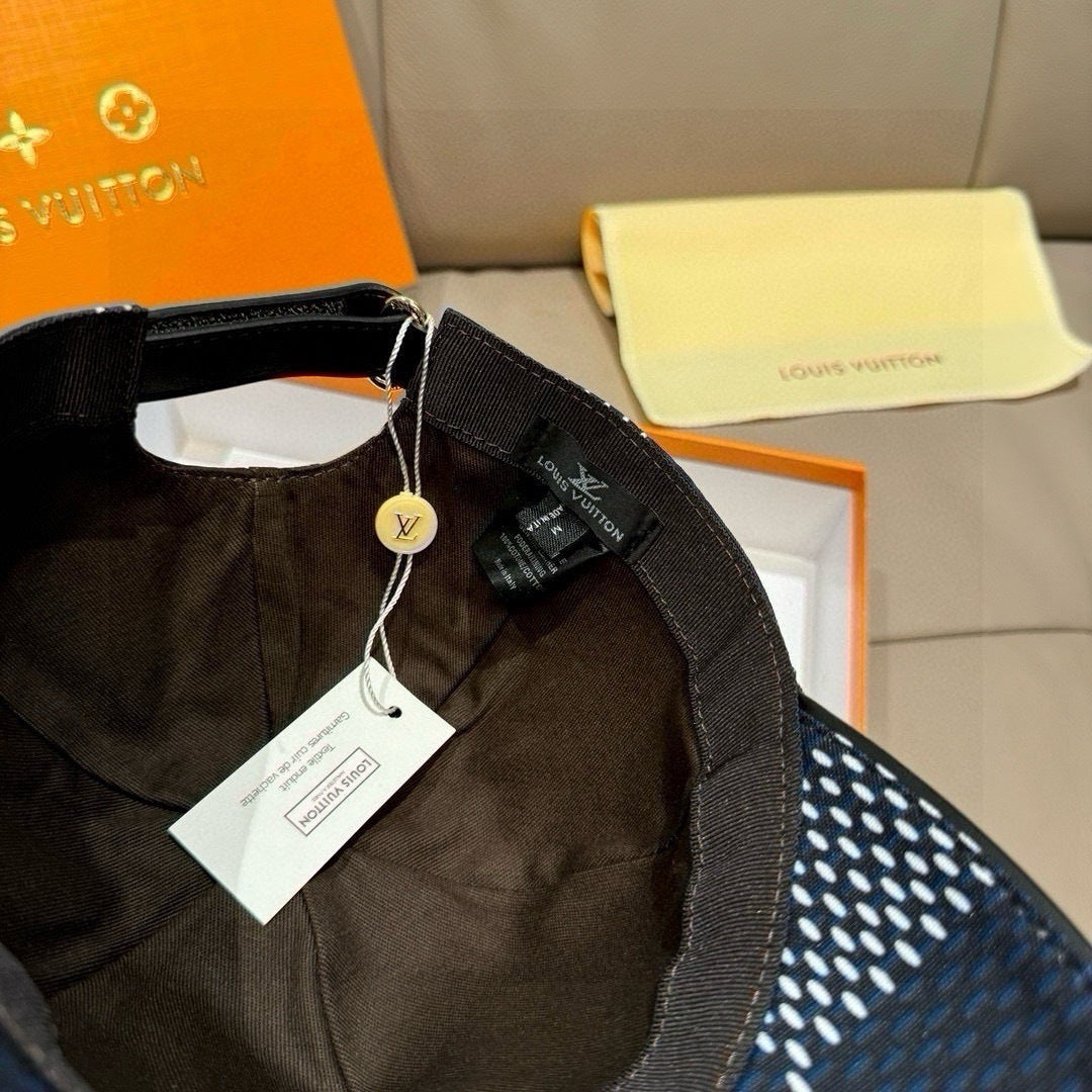 Louis Vuitton baseball cap, interior lining and hanging tag on dark strap