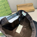 Gucci cap interior with beige lining, size tag, and strap hardware