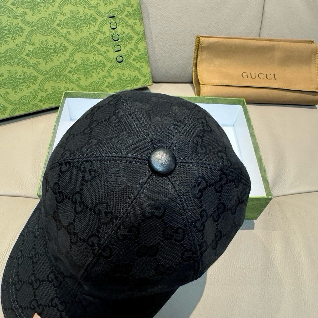 Black Gucci GG monogram baseball cap with round top button detail