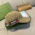 Tan GG monogram baseball cap with Gucci stripe on front panel