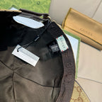 Black cap interior with adjustable strap and hanging product tags