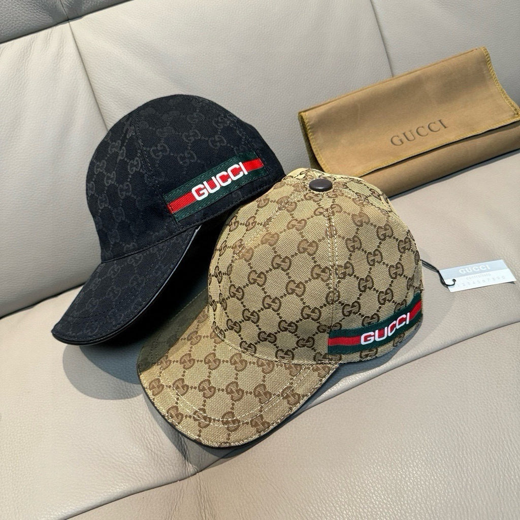 Two Gucci baseball caps: black GG monogram and tan GG monogram with stripes