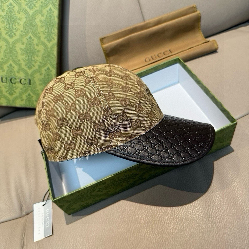 Gucci cap front view with beige GG canvas crown and black textured brim