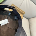 Gucci cap interior with dark strap and label, adjustable inside band