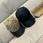 Pair of Gucci caps: beige GG crown and black crown, both with black textured brims