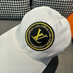 Louis Vuitton white baseball cap with detailed round LV logo patch