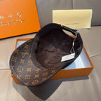 Louis Vuitton cap, interior view with brown monogram fabric and fabric strap.