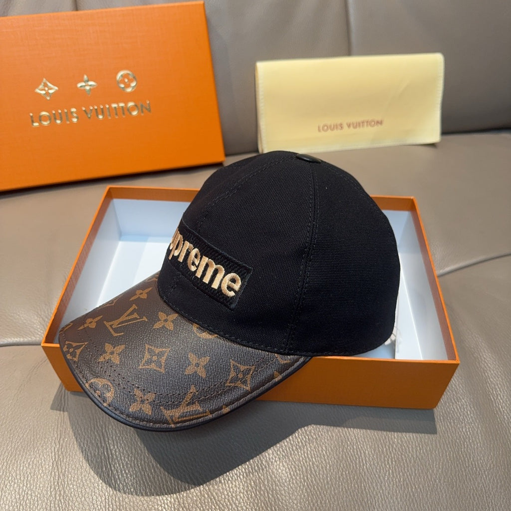 Louis Vuitton cap with black crown and brown monogram brim, Supreme logo band.