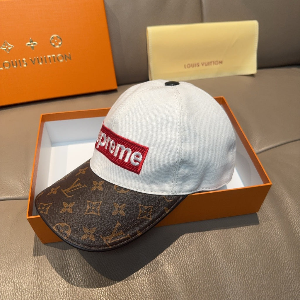 Louis Vuitton cap with white crown, red Supreme patch, and brown monogram brim