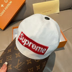 Louis Vuitton cap with white crown and red Supreme front patch over brown monogram brim