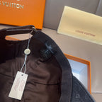 Louis Vuitton monogram baseball cap with hanging product tag, dark fabric