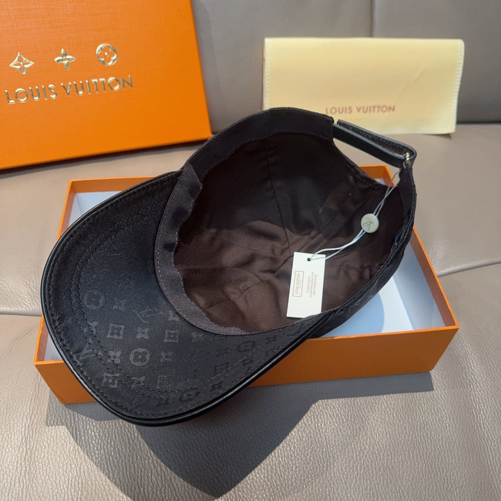 Louis Vuitton monogram baseball cap interior view, dark fabric with hanging tag