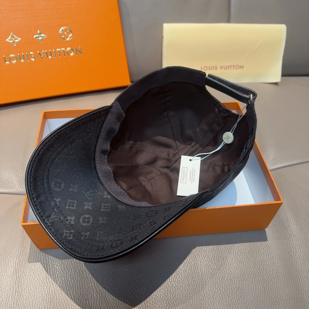 Louis Vuitton monogram baseball cap interior view, dark fabric with hanging tag