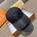 Louis Vuitton monogram baseball cap with curved brim, dark color, stitched panels