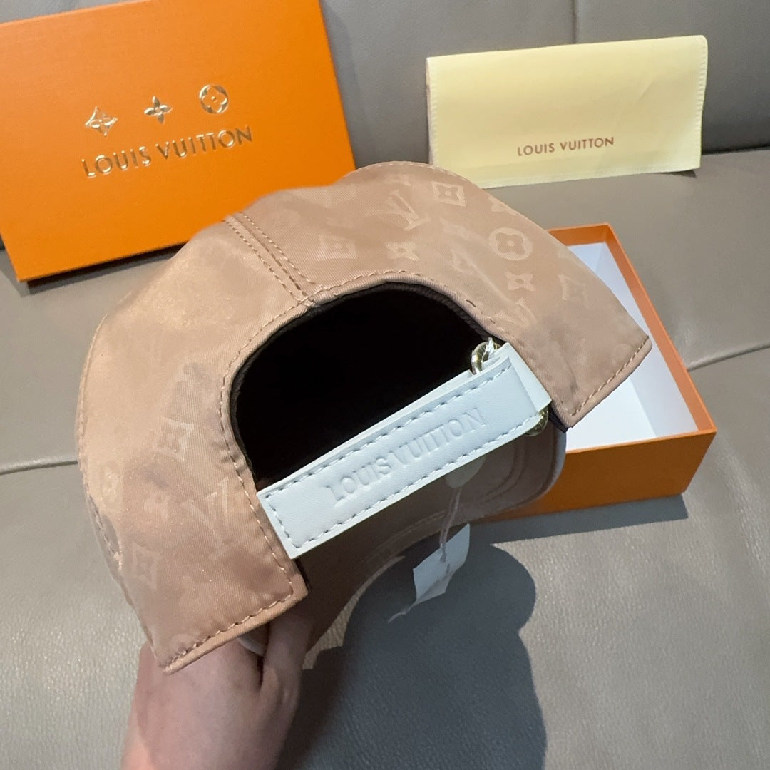 Louis Vuitton tan monogram cap with interior label and wide open front