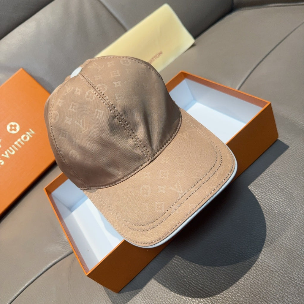 Louis Vuitton monogram cap in tan with curved brim and stitched panels
