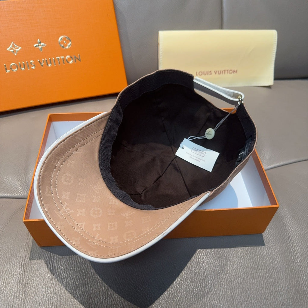 Louis Vuitton two-tone cap with tan monogram outer and dark interior lining