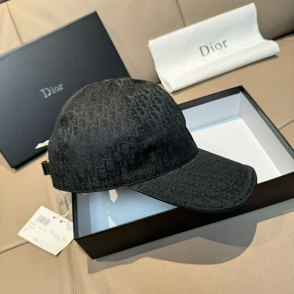 Dior baseball cap with dark monogram pattern, curved brim, and structured panels
