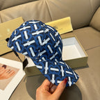 Burberry logo cap with blue and white repeating monogram pattern, side and brim