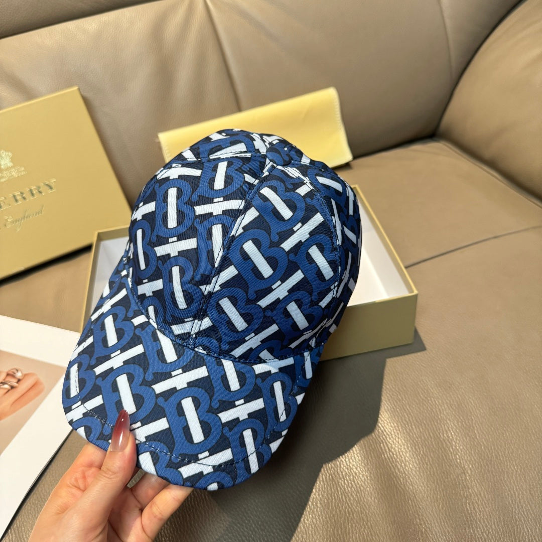 Burberry logo cap with blue and white repeating monogram pattern, front close-up