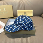 Burberry logo cap with blue and white repeating monogram pattern, curved brim
