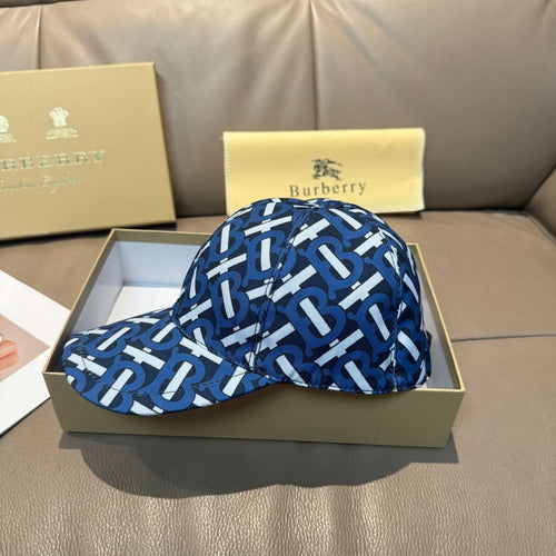 Burberry logo cap with blue and white repeating monogram pattern, curved brim