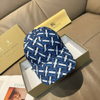Burberry logo cap with blue and white repeating monogram pattern, curved brim