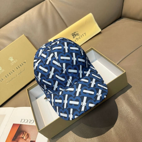 Burberry logo cap with blue and white repeating monogram pattern, curved brim