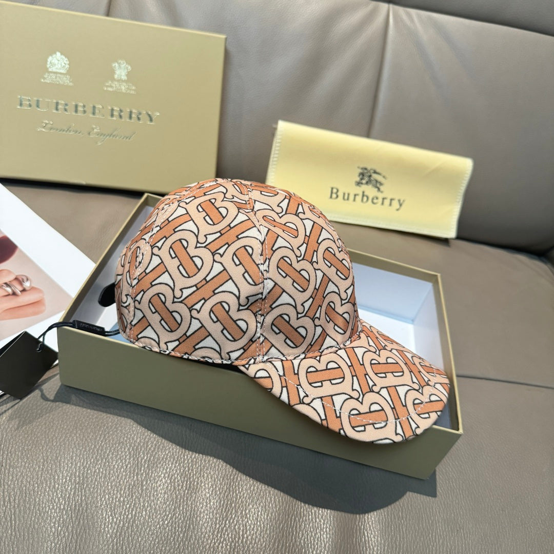 Patterned baseball cap with tan, rust and black logo print, front view