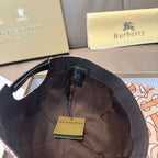 Black baseball cap interior with adjustable strap and Burberry hanging label
