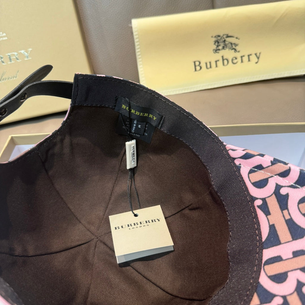 Burberry cap interior with black lining, adjustable strap, and hanging label