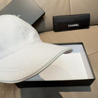 White baseball cap side profile with curved brim stitching