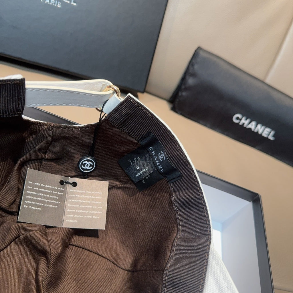 Brown baseball cap with interior tag and fabric strap detail