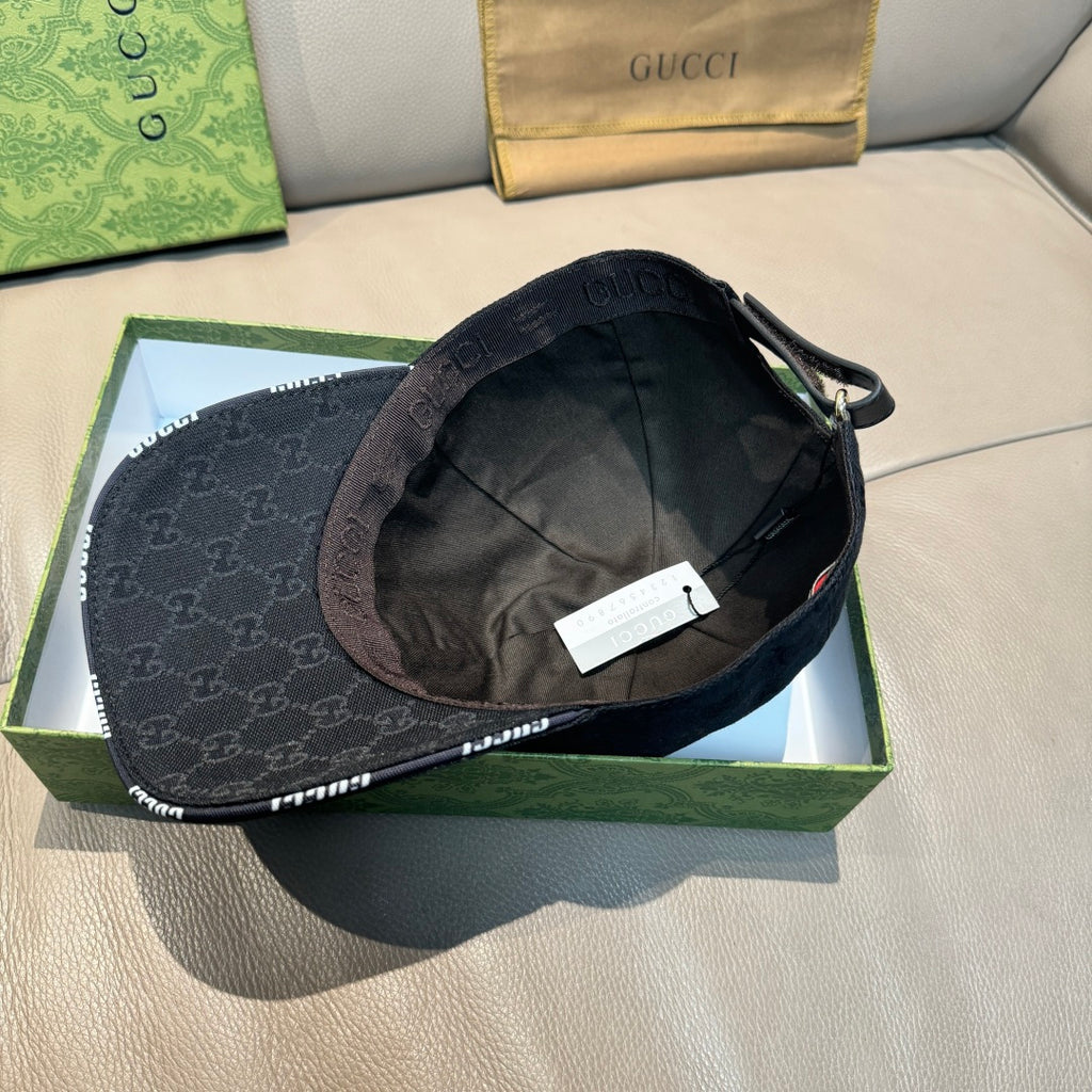 Black Gucci baseball cap interior view with adjustable strap and fabric lining.