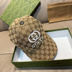 Gucci GG canvas baseball cap in beige with white GG emblem and top button
