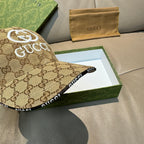 Gucci GG canvas baseball cap in beige with white GG emblem and side logo text