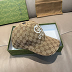 Gucci GG canvas baseball cap in beige with white GG emblem and top button