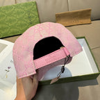 Pink Gucci GG-pattern cap interior with adjustable strap and Gucci label