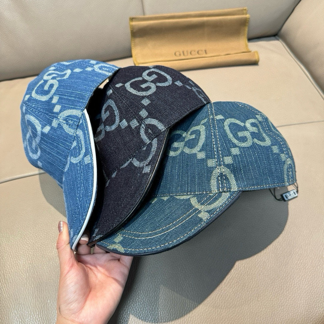 Gucci denim baseball cap pair, blue and black GG logo crowns with curved brims