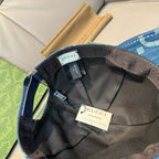 Gucci denim cap interior with black lining, size/brand label and adjustable strap