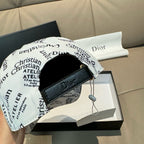 White Dior cap with Christian Dior logo print and black adjustable strap