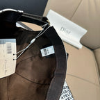 Black Dior cap with allover Christian Dior logo print, adjustable strap, tag