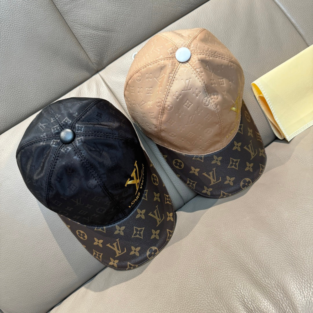 Pair of monogram baseball caps, one beige and one dark, both with LV emblems