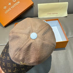 Beige monogram baseball cap crown with light blue button on top