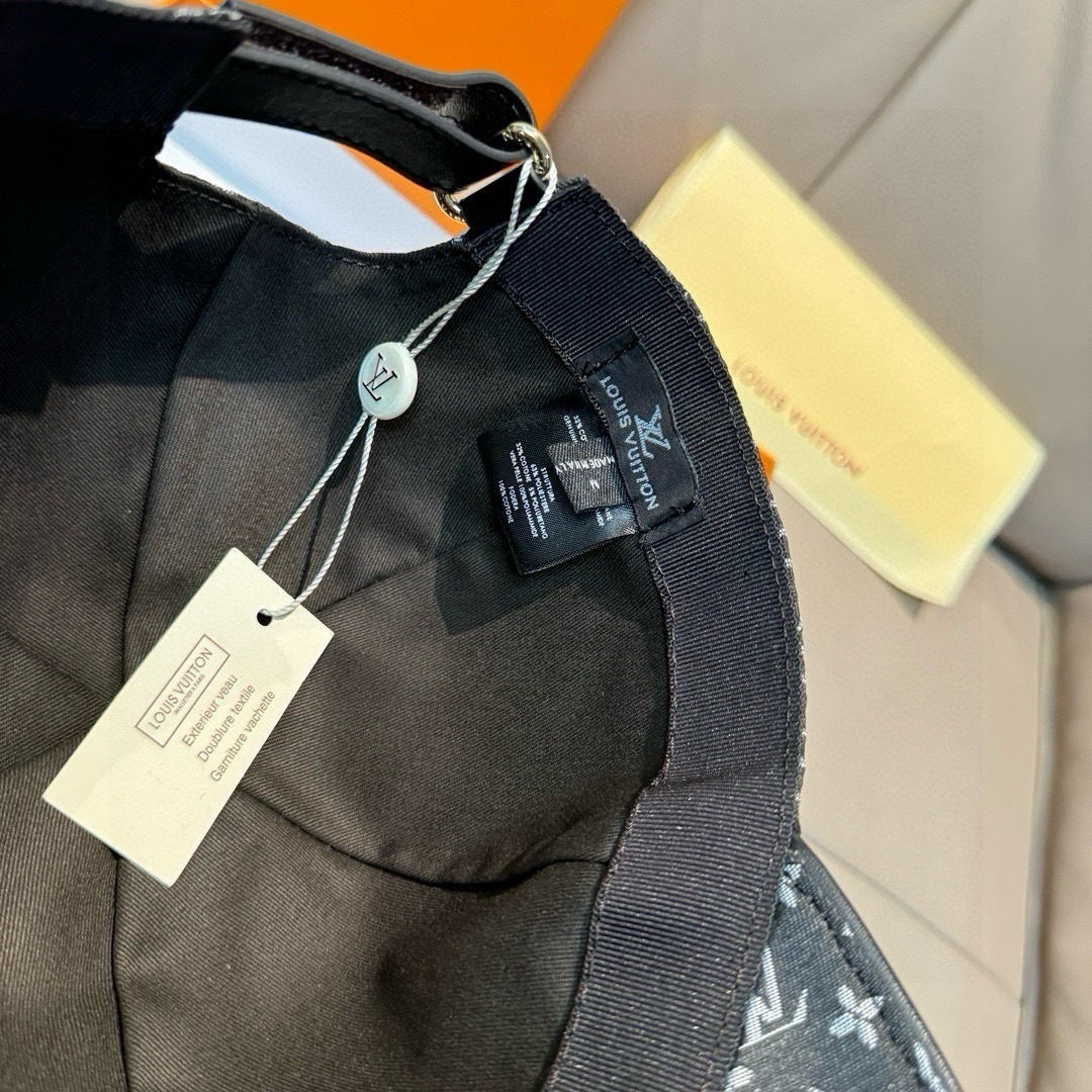Louis Vuitton black monogram cap with hang tags