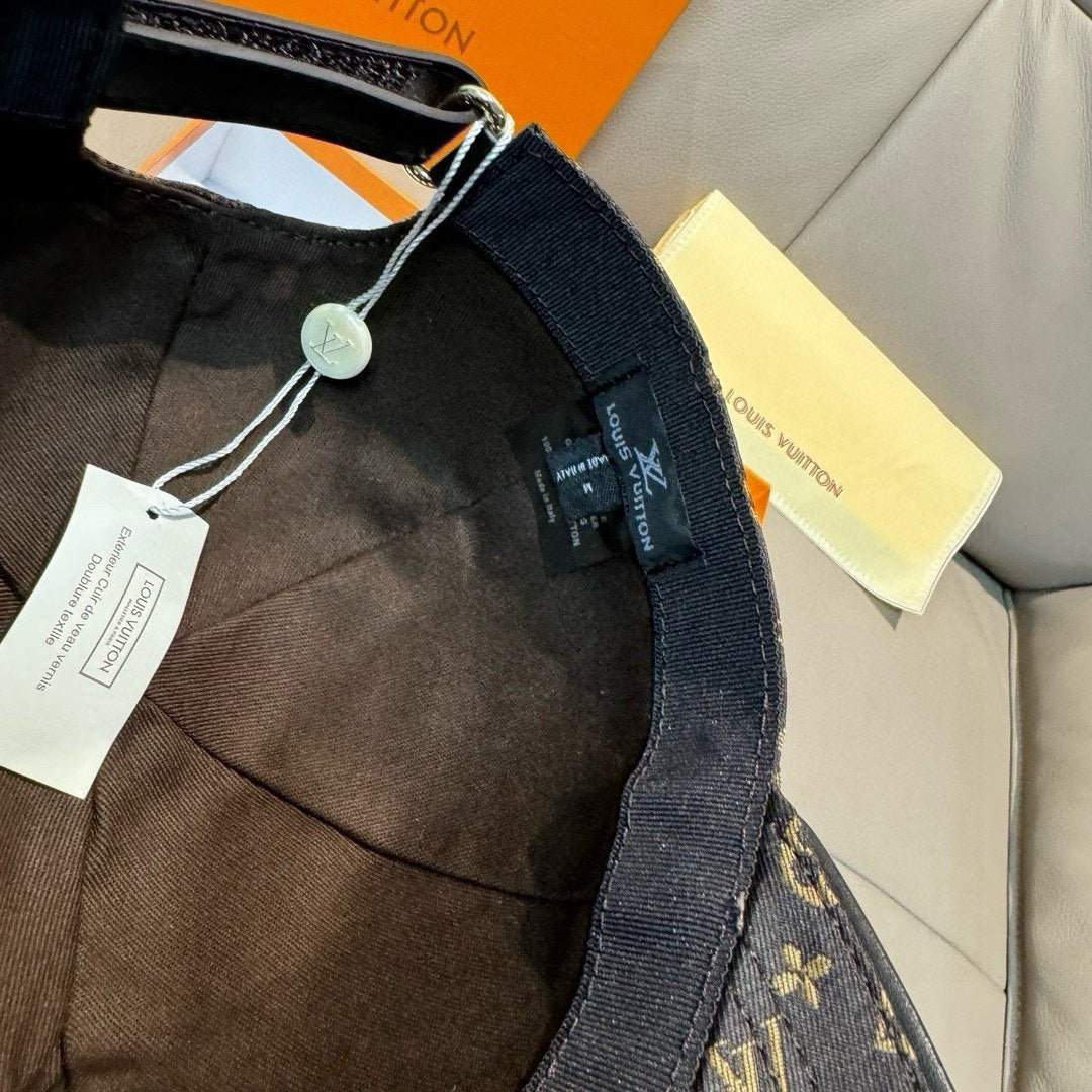 Louis Vuitton cap inside view with adjustable strap, hanging tag, and inner label.